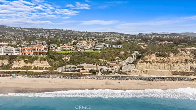 an aerial view of residential house with parking space