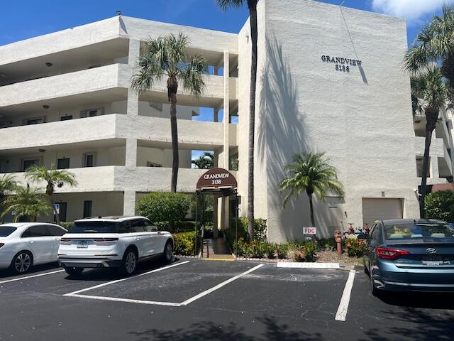 a car parked in front of a building