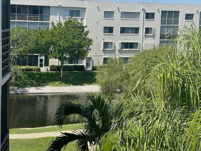 a view of a street with cars