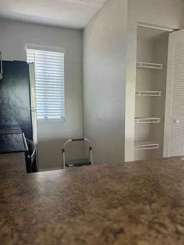 a room with closet and window