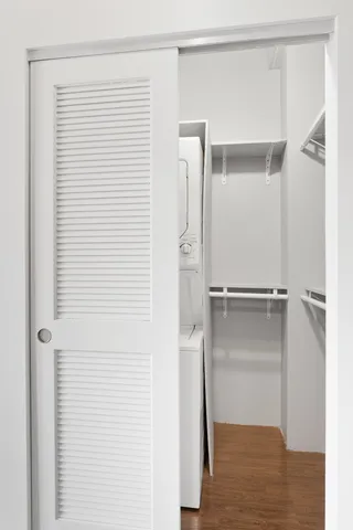 a bathroom with a glass shower door