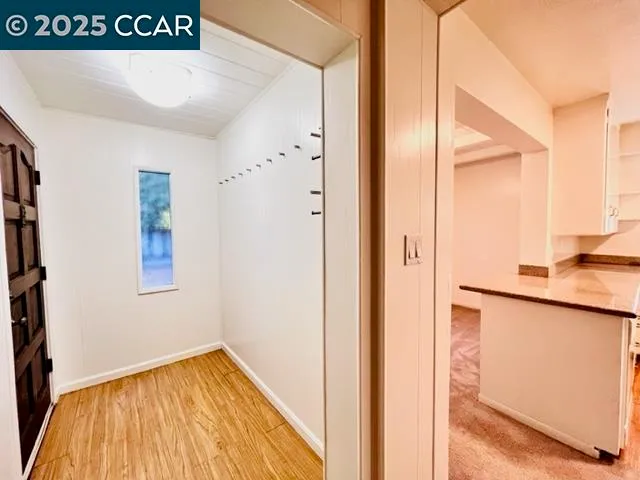 a spacious bathroom with a sink and a mirror