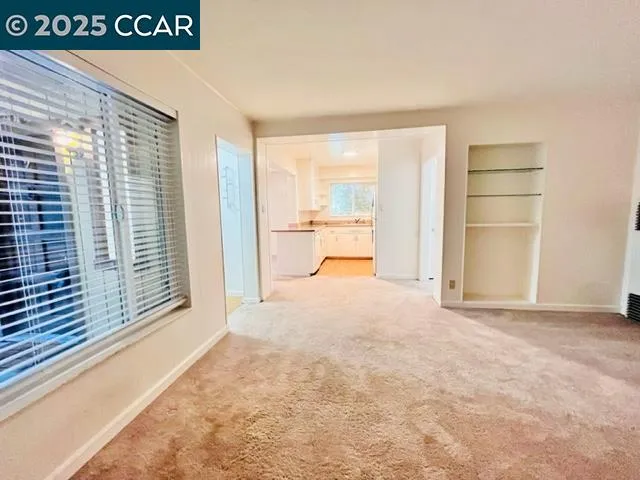 a view of a kitchen with a sink
