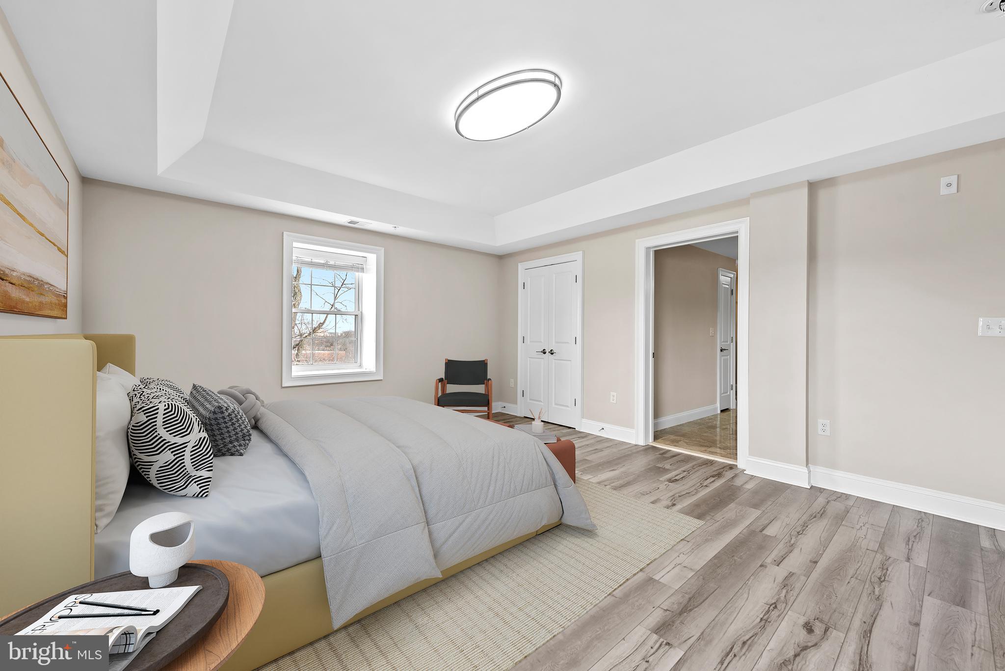 6301 Edsall Road, Unit 424 Alexandria, VA 22312 - Photo 18 of 30 a bedroom with a bed and closet