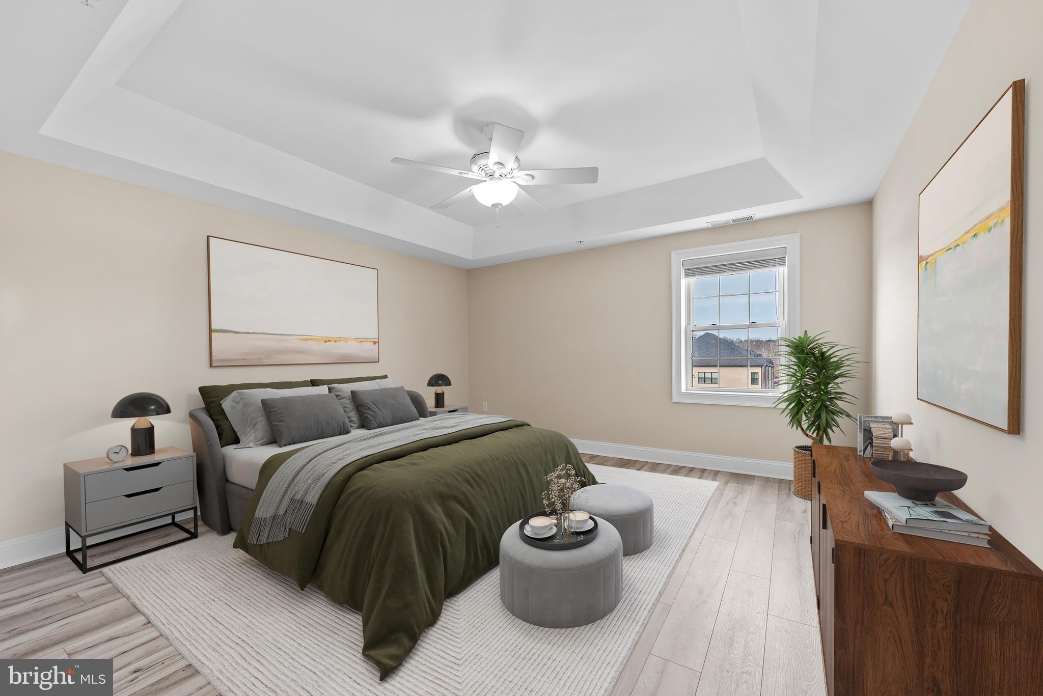 6301 Edsall Road, Unit 424 Alexandria, VA 22312 - Photo 23 of 30 a spacious bedroom with a bed and a flat screen tv