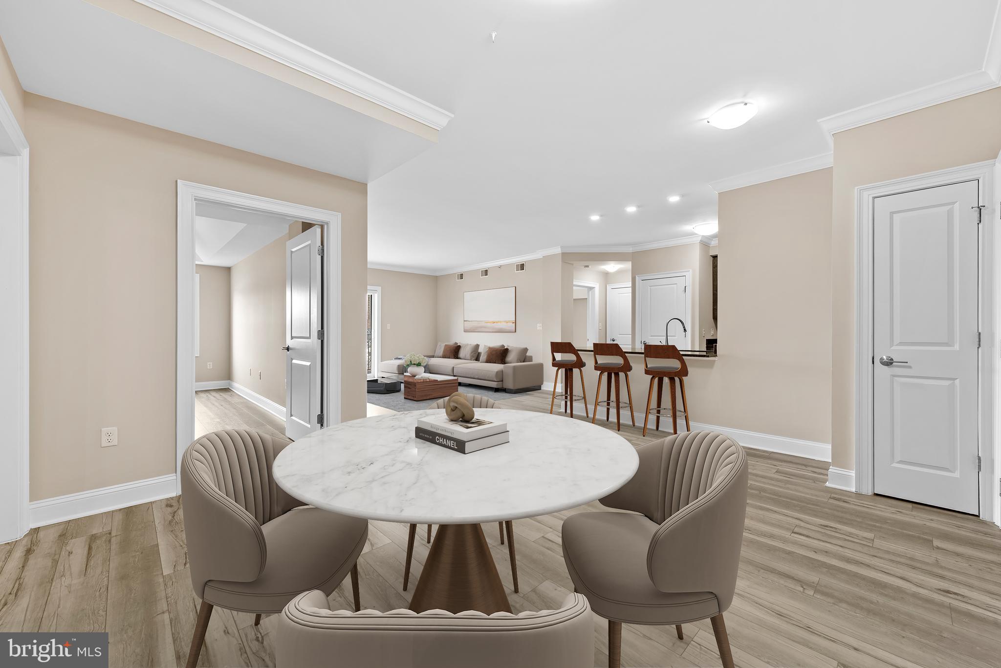 6301 Edsall Road, Unit 424 Alexandria, VA 22312 - Photo 5 of 30 a view of a dining room with furniture