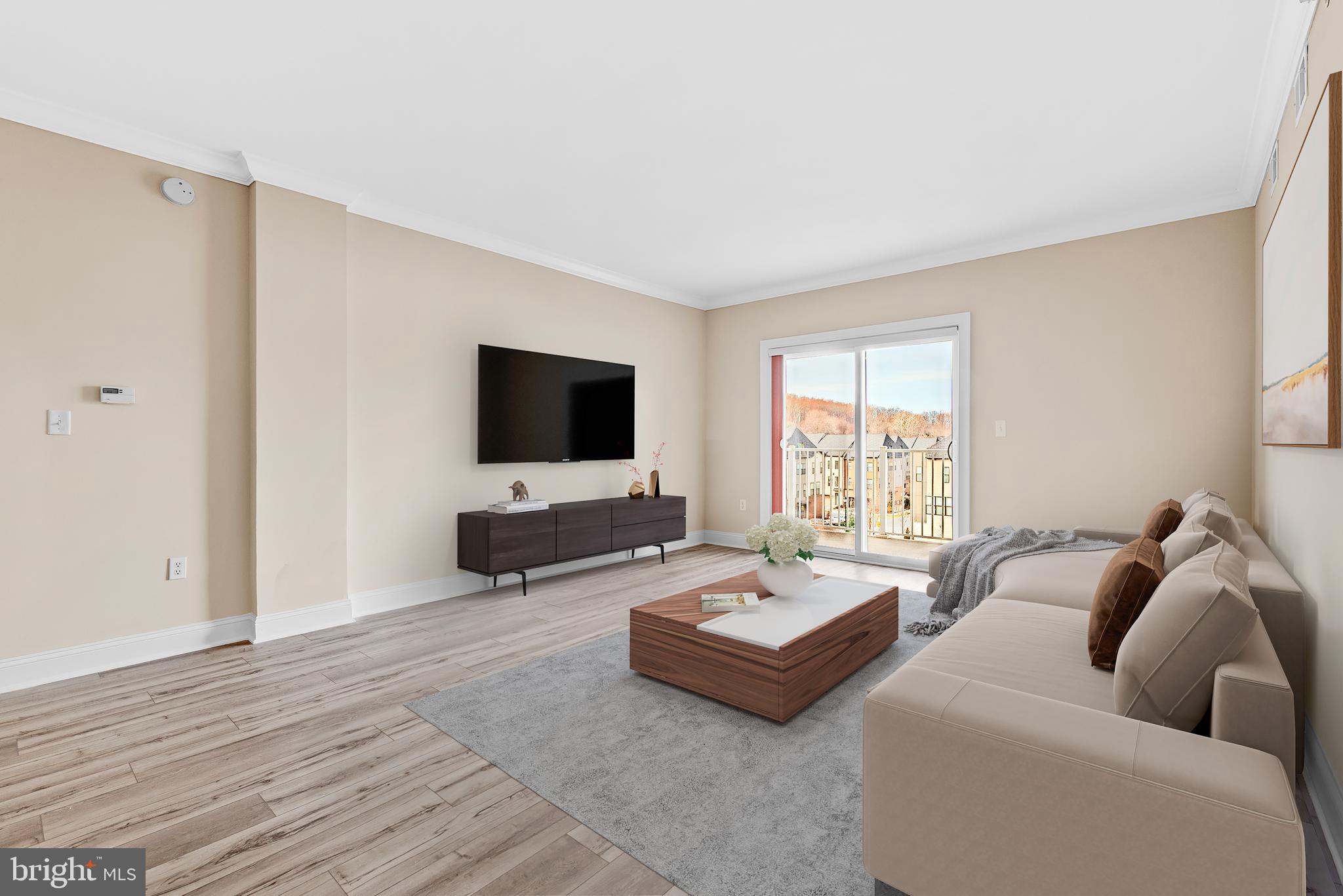 6301 Edsall Road, Unit 424 Alexandria, VA 22312 - Photo 7 of 30 a living room with furniture and a flat screen tv