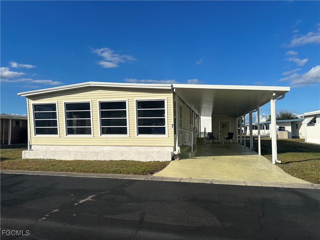 a view of a house with a patio