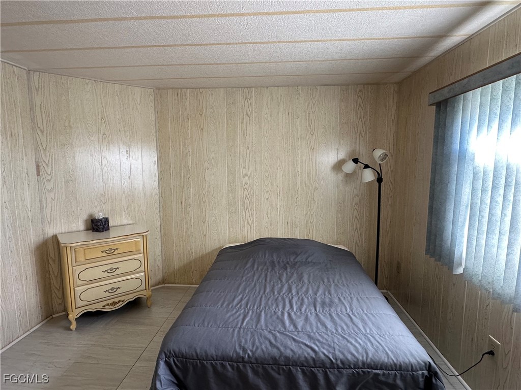 7 Elder Alva, FL 33920 - Photo 17 of 47 a room with a bed and a window