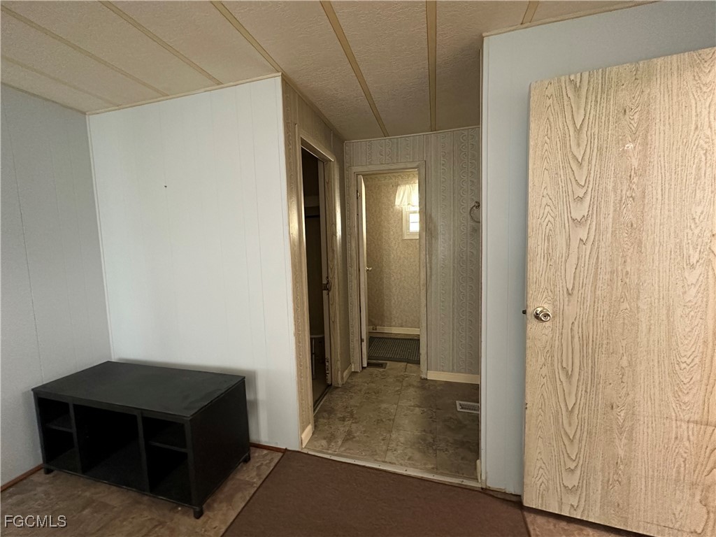7 Elder Alva, FL 33920 - Photo 23 of 47 a room that has a bed in it