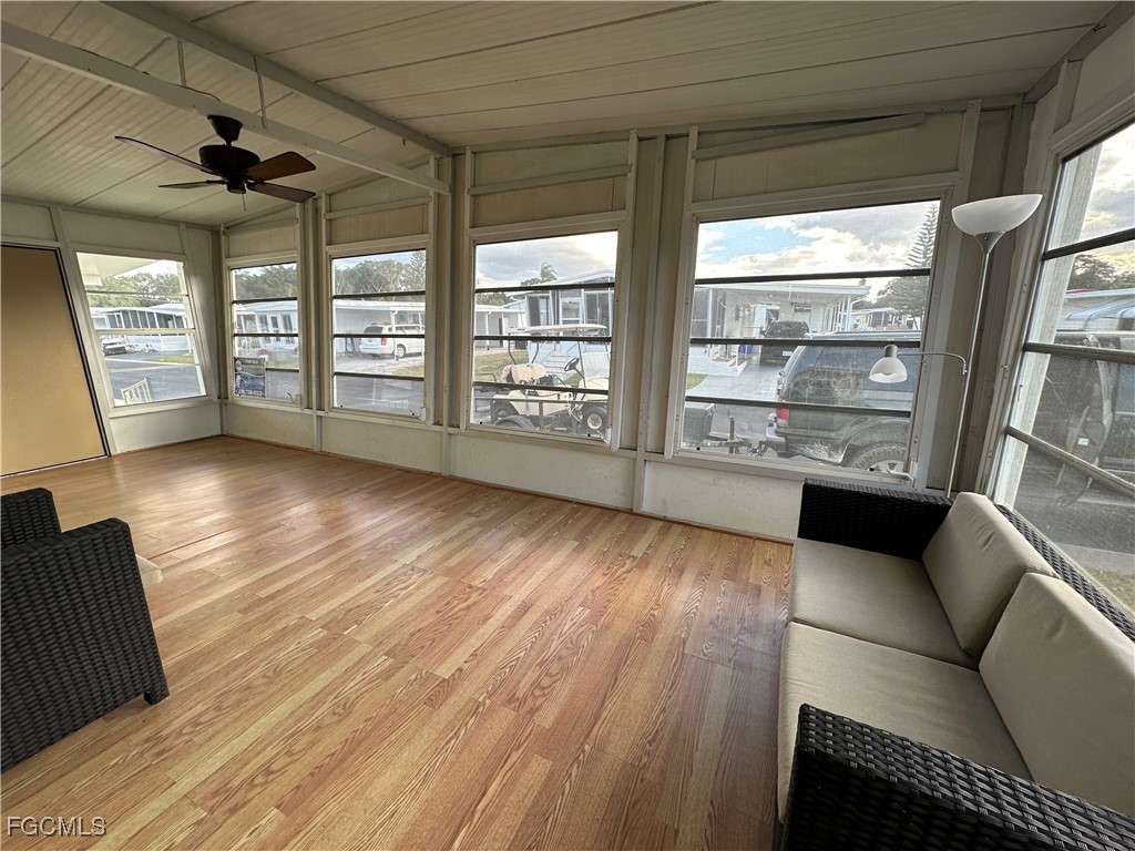 7 Elder Alva, FL 33920 - Photo 27 of 47 a view of a livingroom with furniture wooden floor and windows