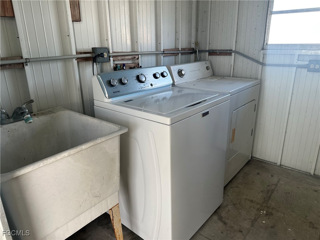 7 Elder Alva, FL 33920 - Photo 29 of 47 a utility room with dryer and washer