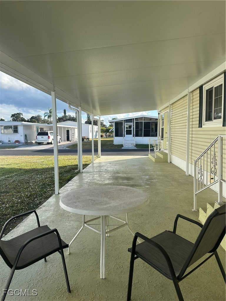 7 Elder Alva, FL 33920 - Photo 30 of 47 a swimming pool with outdoor seating and yard