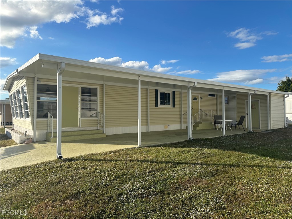 7 Elder Alva, FL 33920 - Photo 34 of 47 a view of a house with a backyard