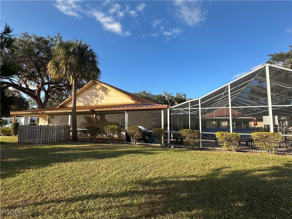7 Elder Alva, FL 33920 - Photo 37 of 47 a front view of a house with a yard