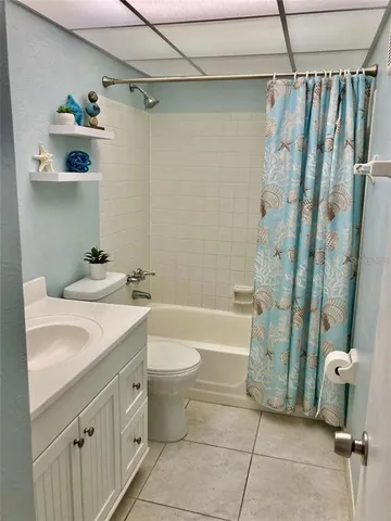 a bathroom with a sink a toilet and a bathtub