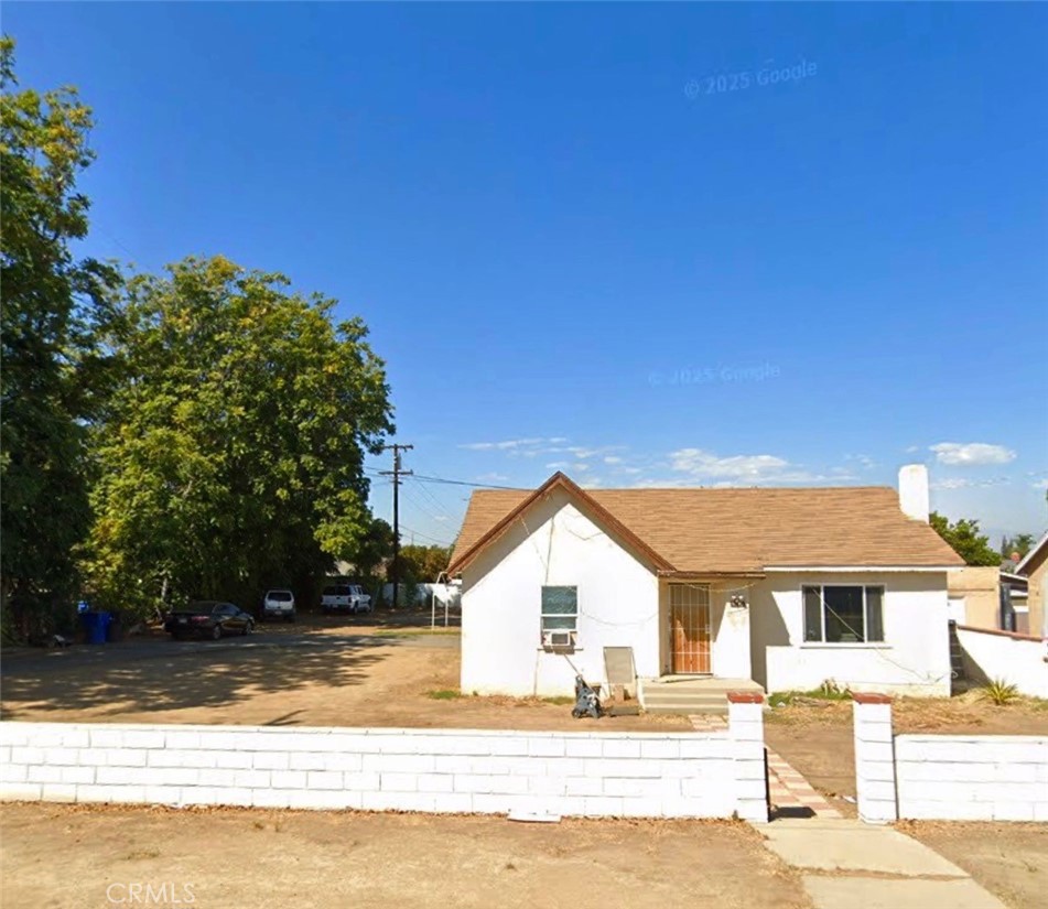 9293 Garfield Street Riverside, CA 92503 - Photo 1 of 1 a view of a house with a patio