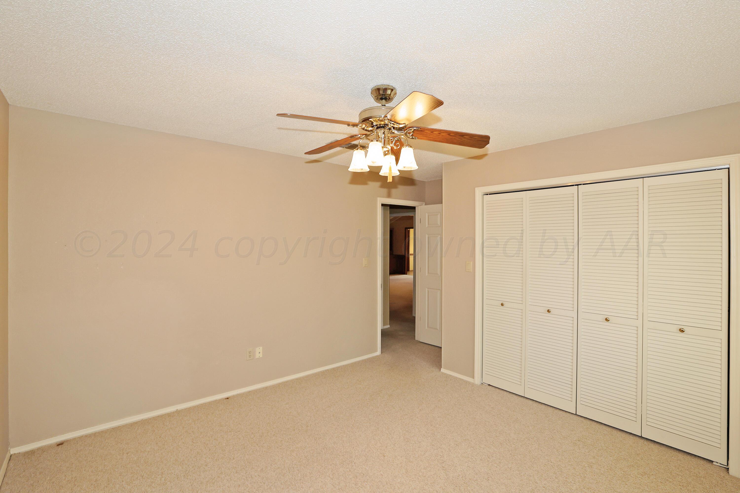 6819 Cloud Crest Drive Amarillo, TX 79124 - Photo 26 of 37 a view of a chandelier fan in a room