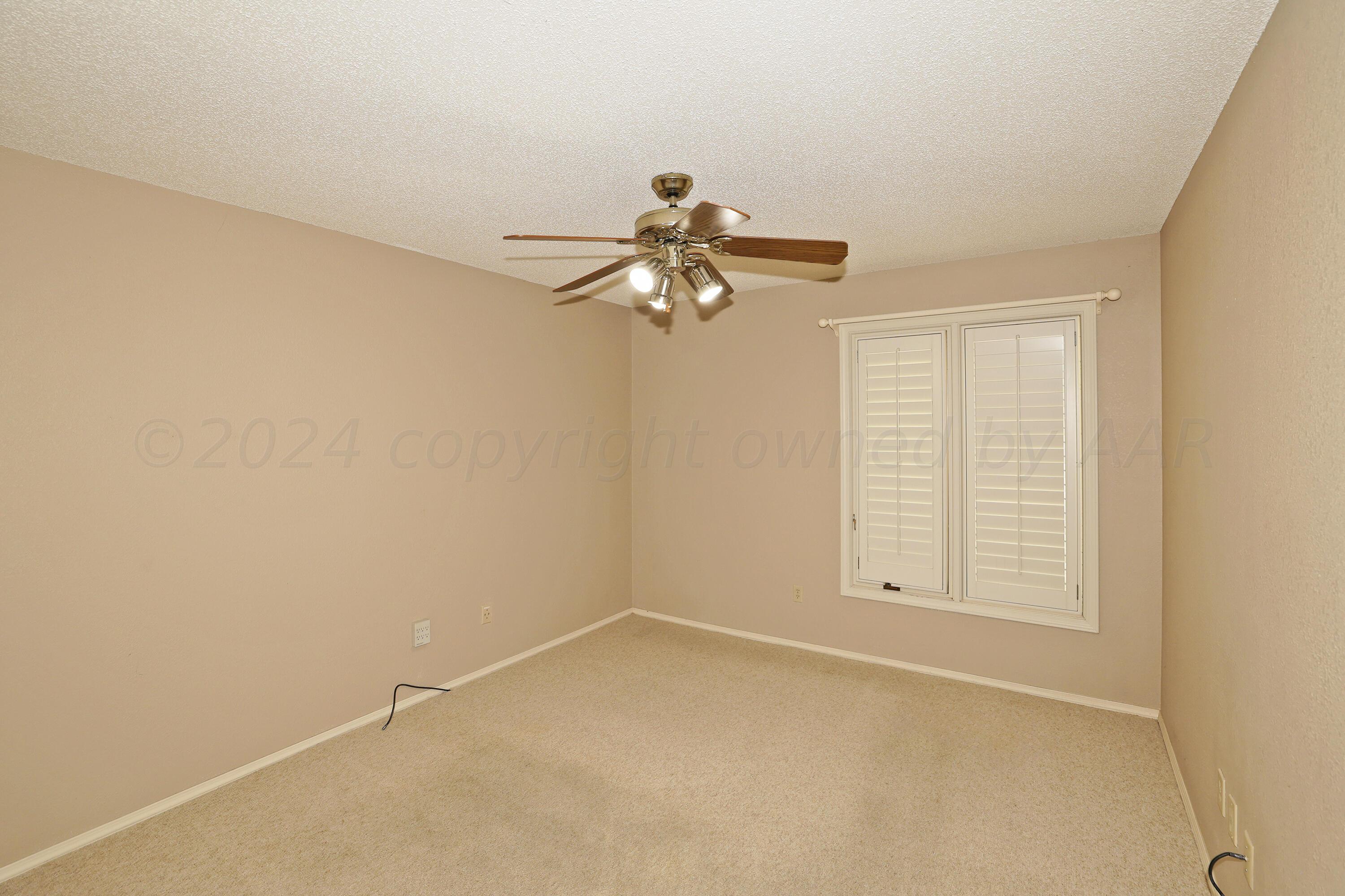 6819 Cloud Crest Drive Amarillo, TX 79124 - Photo 27 of 37 wooden floor in an empty room with a window