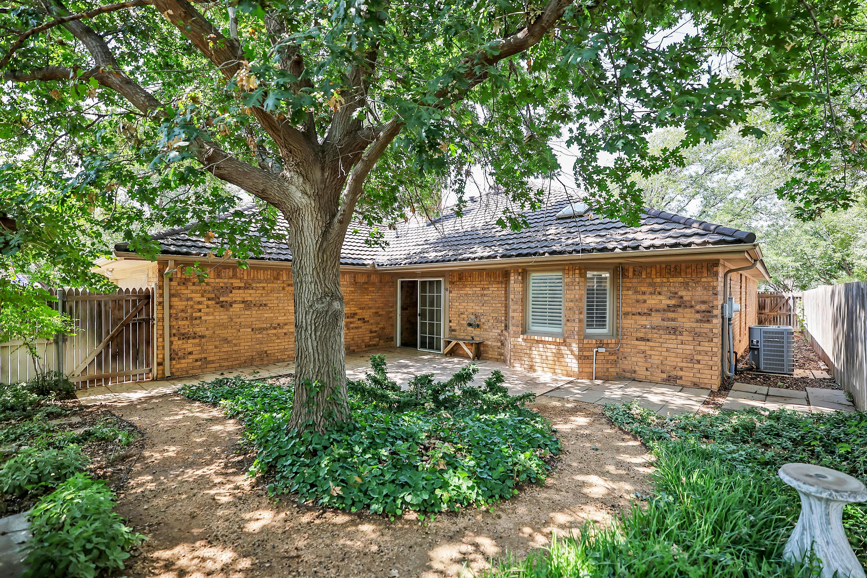 6819 Cloud Crest Drive Amarillo, TX 79124 - Photo 34 of 37 front view of a house with a big yard