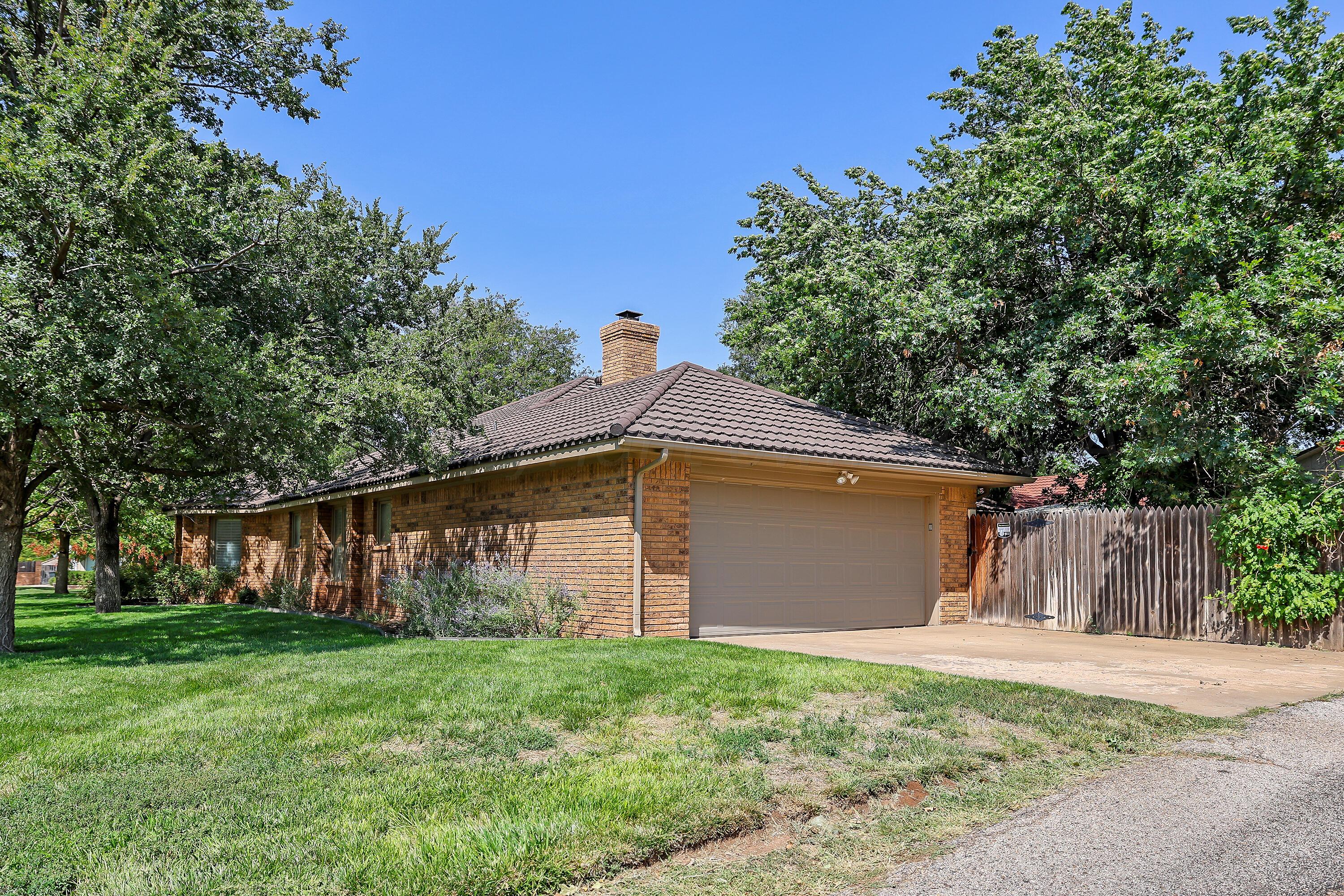 6819 Cloud Crest Drive Amarillo, TX 79124 - Photo 37 of 37 a backyard of a house with lots of green space