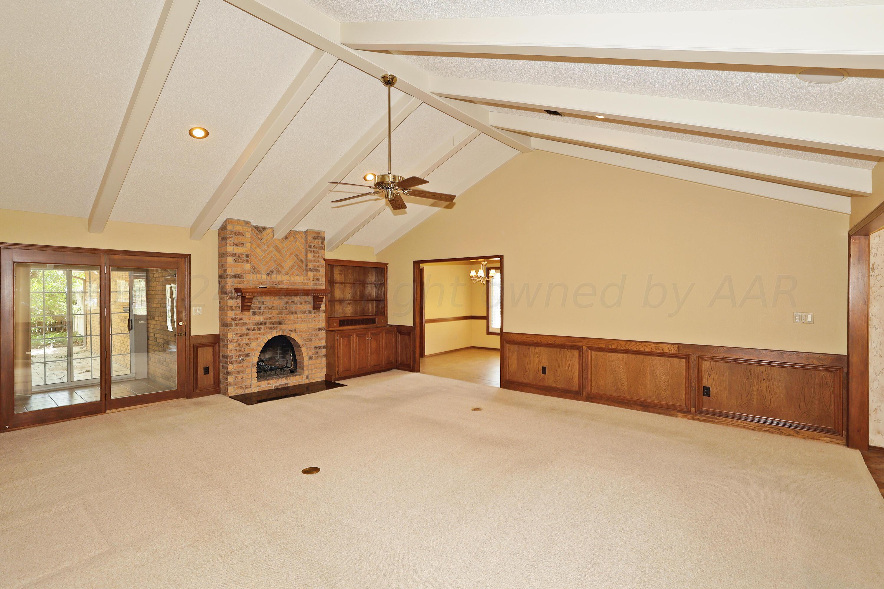 6819 Cloud Crest Drive Amarillo, TX 79124 - Photo 8 of 37 a view of a livingroom with a fireplace