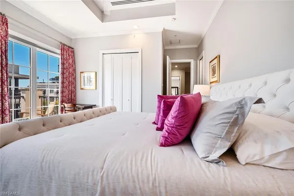 a bed room with a bed and a couch