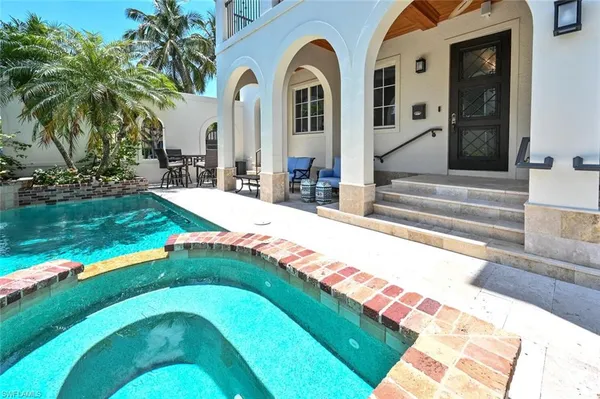 a view of a house with a swimming pool