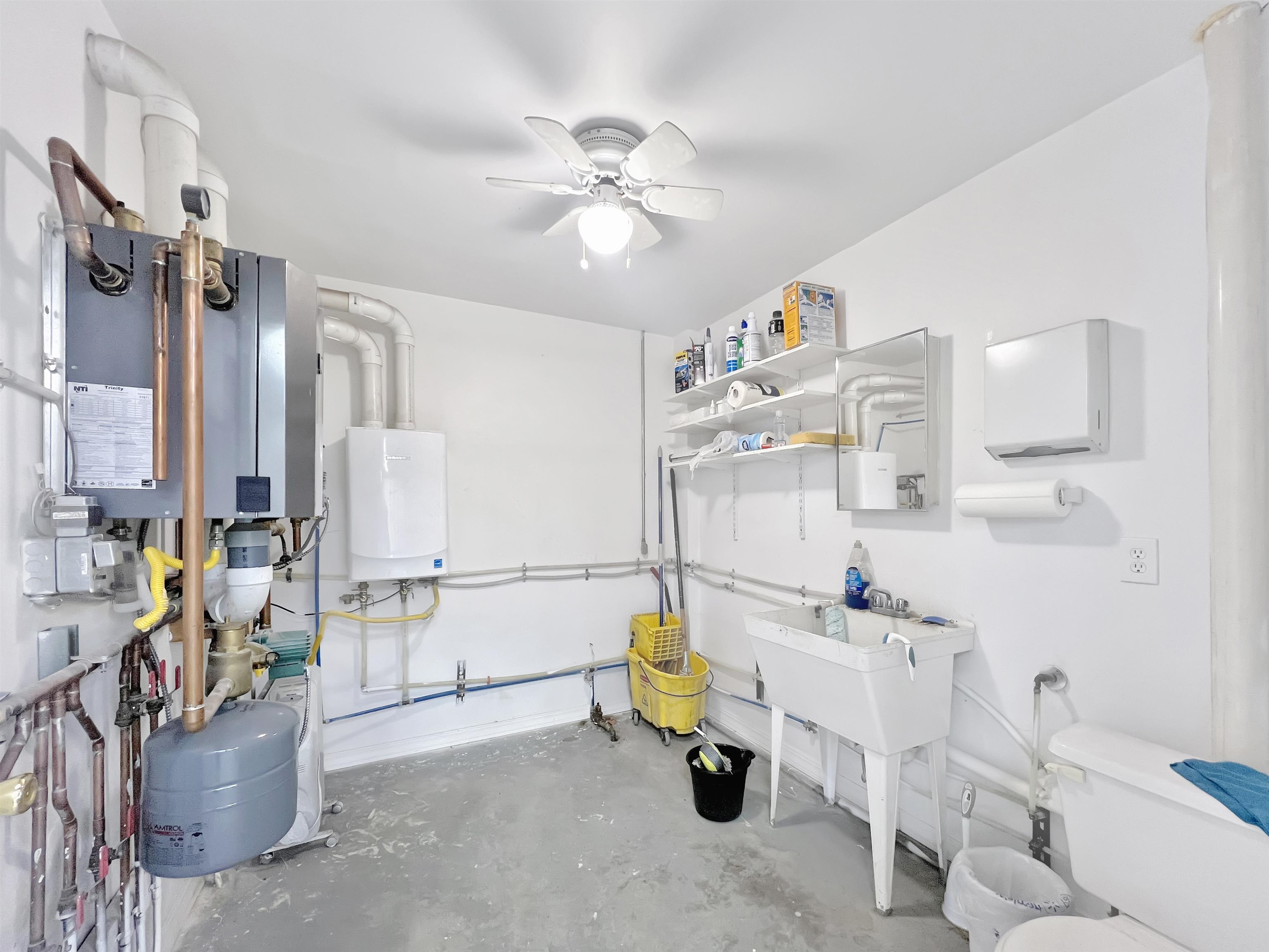 26767 Cedar Mesa Road Cedaredge, CO 81413 - Photo 23 of 28 a view of a dining room with furniture and a chandelier