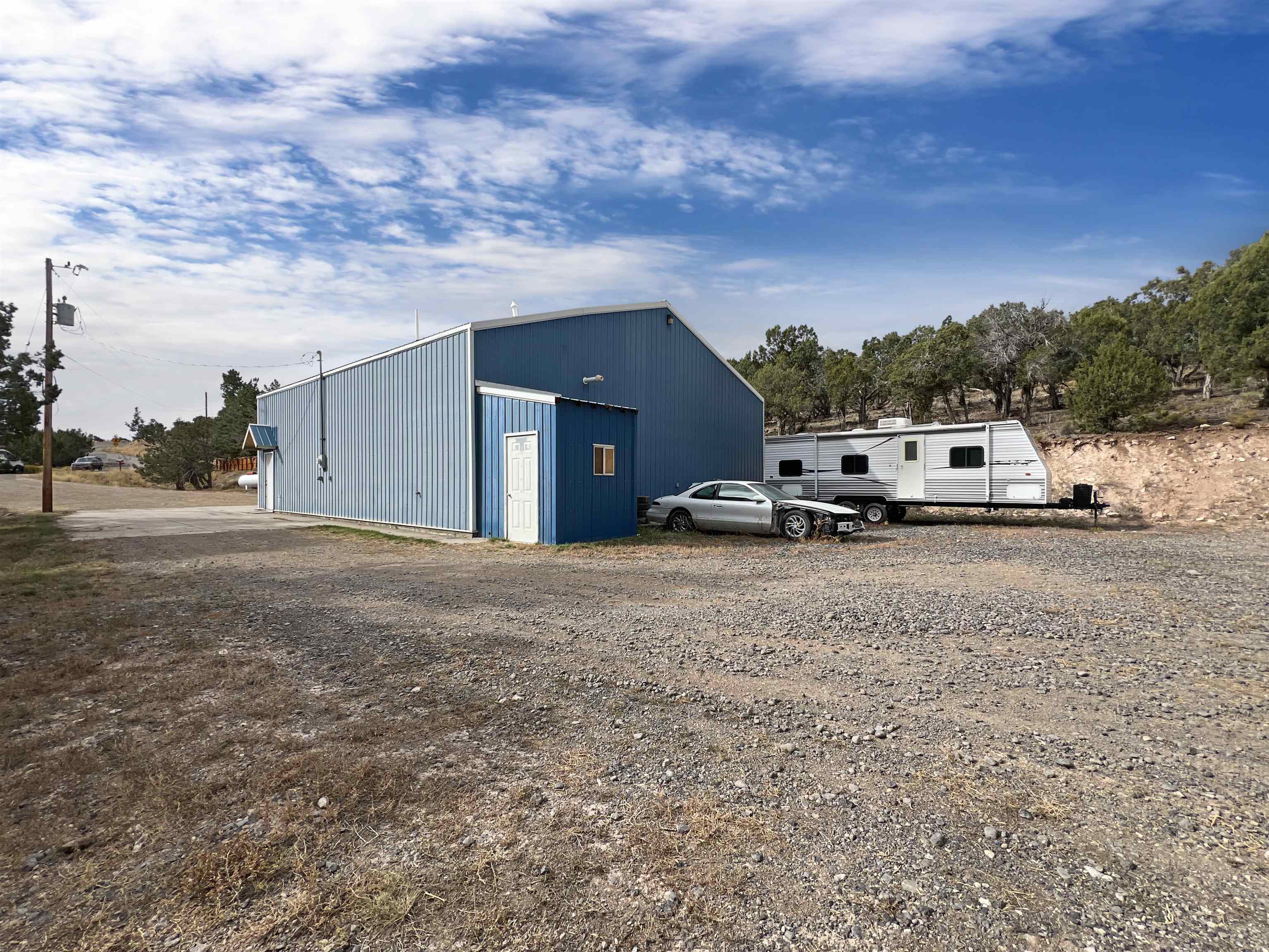 26767 Cedar Mesa Road Cedaredge, CO 81413 - Photo 24 of 28 a view of car parked in front of house
