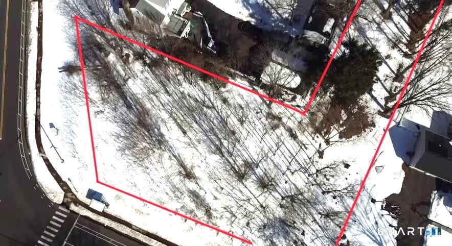 446 Maple Hill Avenue Newington, CT 06111 - Photo 6 of 13 a view of tree in middle of a house