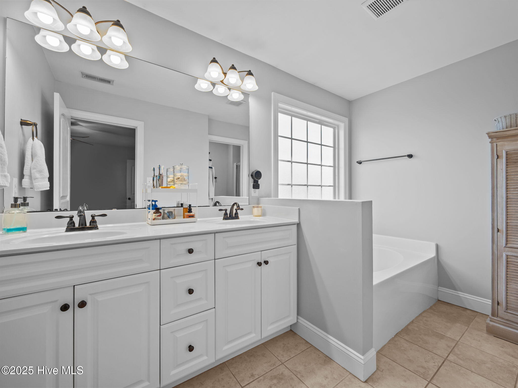 123 Beagle Drive Hubert, NC 28539 - Photo 23 of 53 principal bath with soaking tub and separate shower- double sinks