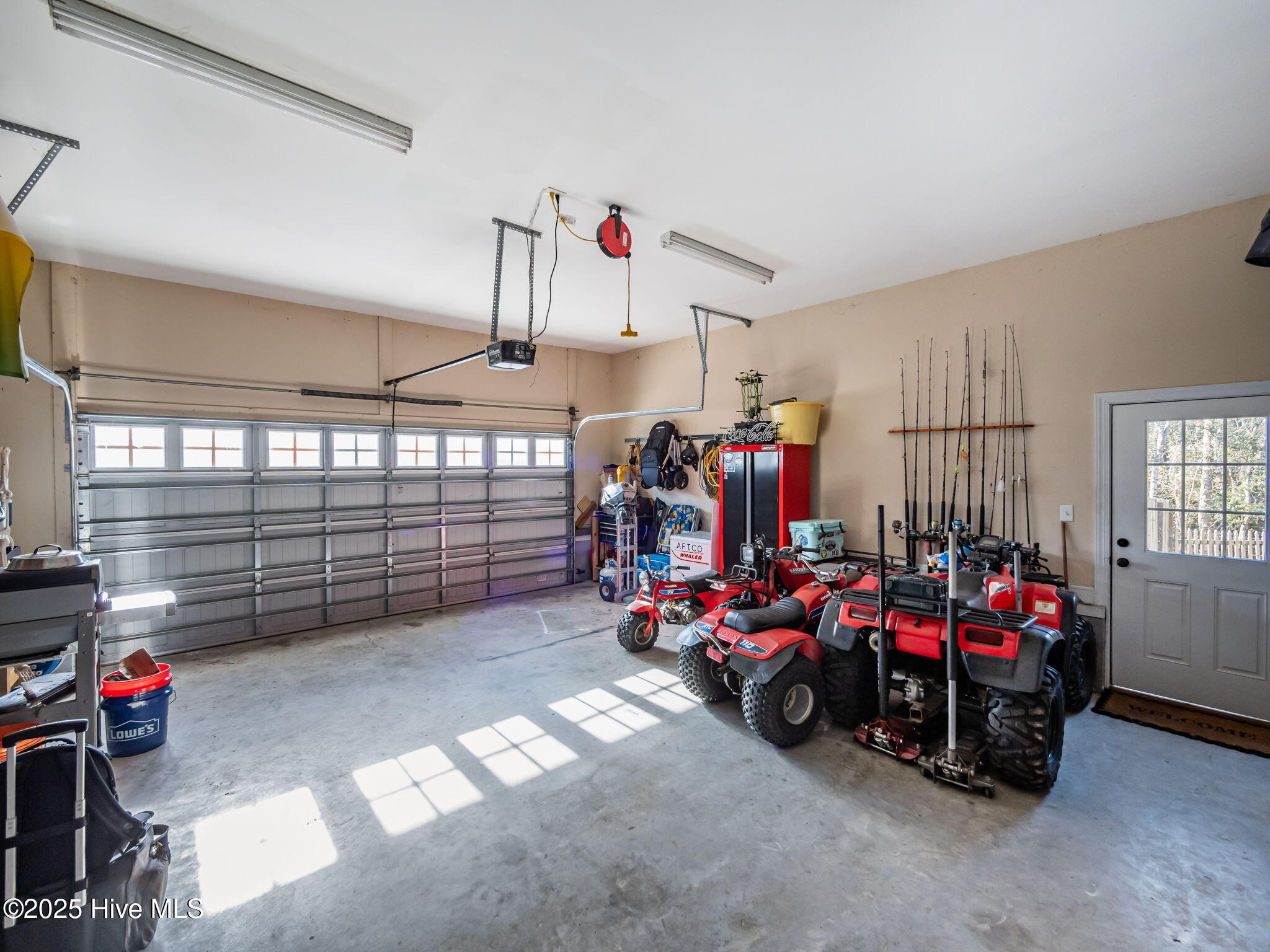 123 Beagle Drive Hubert, NC 28539 - Photo 35 of 53 Garage with built in shelving