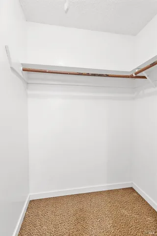 a view of small space with racks on the wall