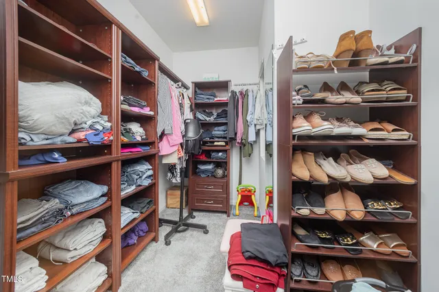 a bathroom with a double vanity sink