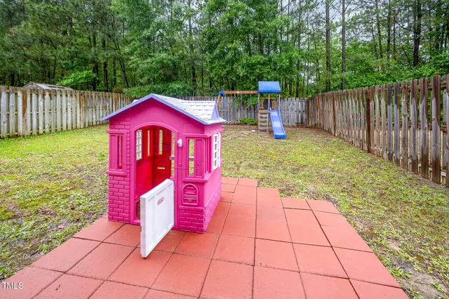 a view of a room with storage and utility room