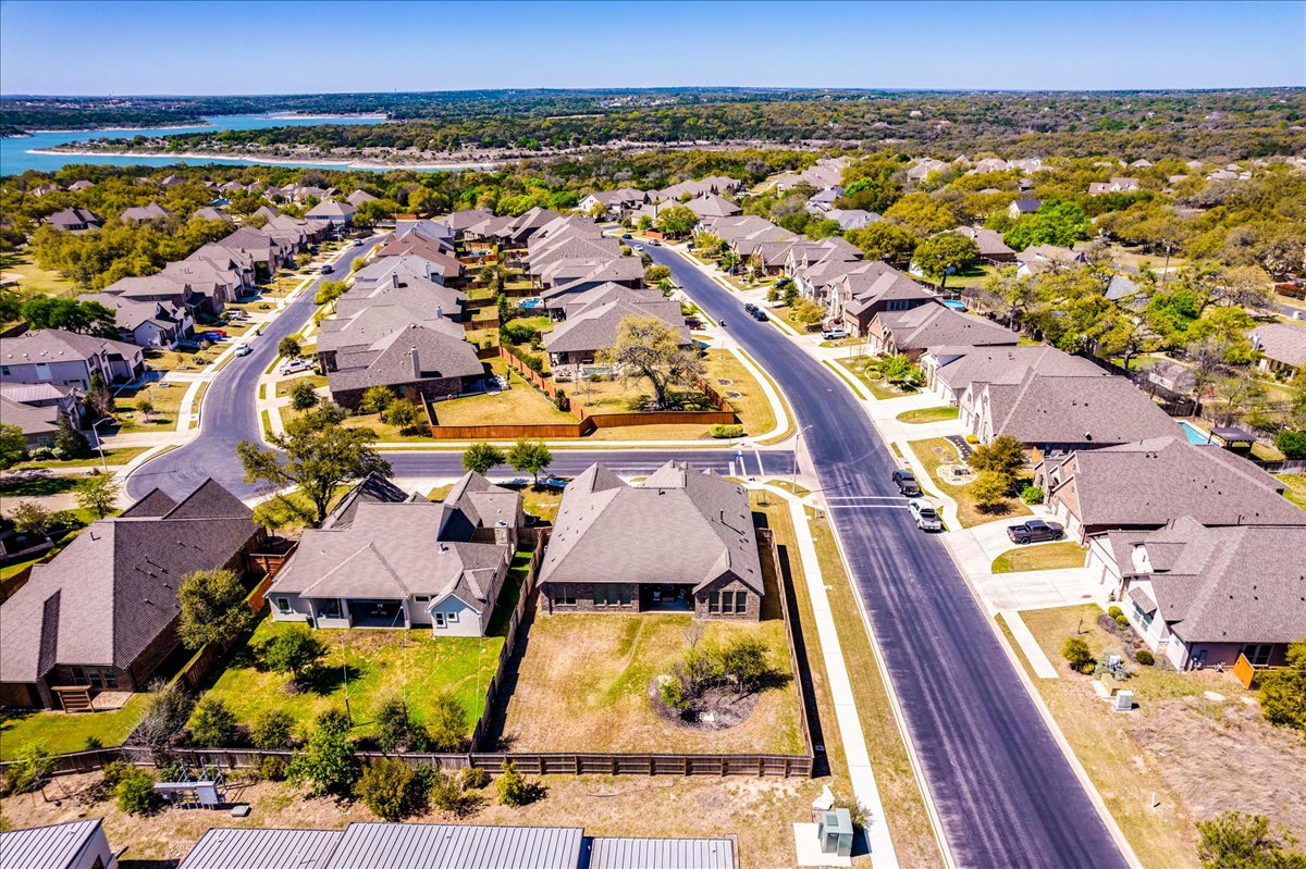101 Lake Spring Circle Georgetown, TX 78633 - Photo 37 of 40 an aerial view of residential houses with outdoor space