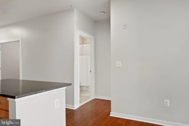 a bathroom with a toilet and a bathtub