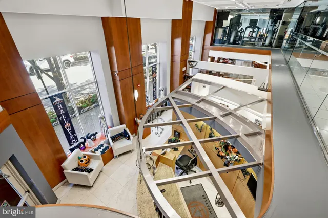 a picture of a bench in front of a wall