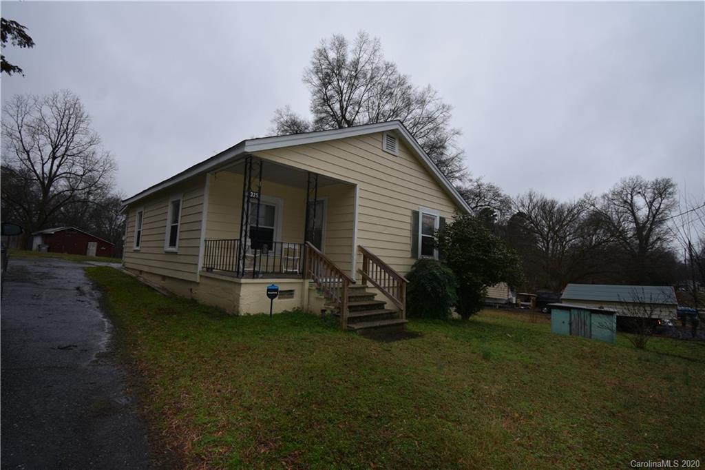 325 Queens Road Gastonia, NC 28052 - Photo 3 of 4 a front view of a house with garden