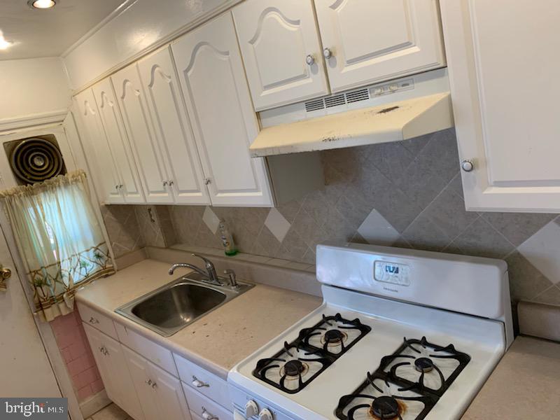 1912 D Street Northeast Washington, DC 20002 - Photo 8 of 39 Kitchen door that leads to back porch