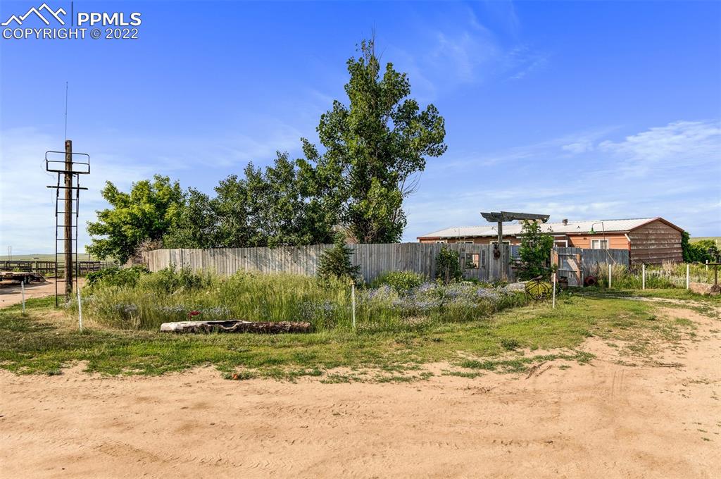 33895 East Jones Road Yoder, CO 80864 - Photo 36 of 45 a view of a fountain in front of a house