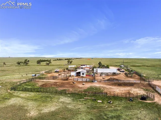 a view of a large body of water with lots of buildings in the background