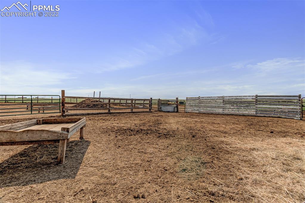 33895 East Jones Road Yoder, CO 80864 - Photo 43 of 45 a view of a lake with table and chair