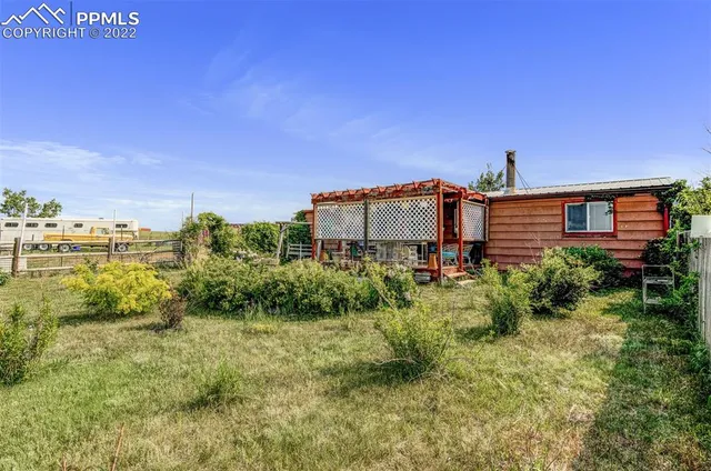 a view of a big yard in front of a building