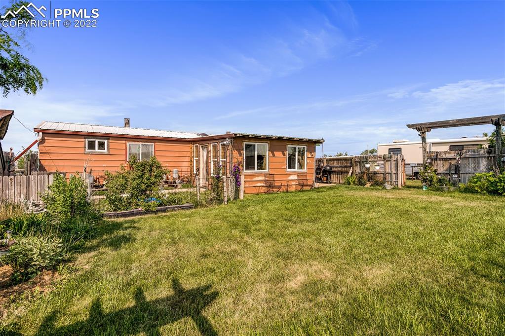 33895 East Jones Road Yoder, CO 80864 - Photo 8 of 45 a view of a house with a big yard