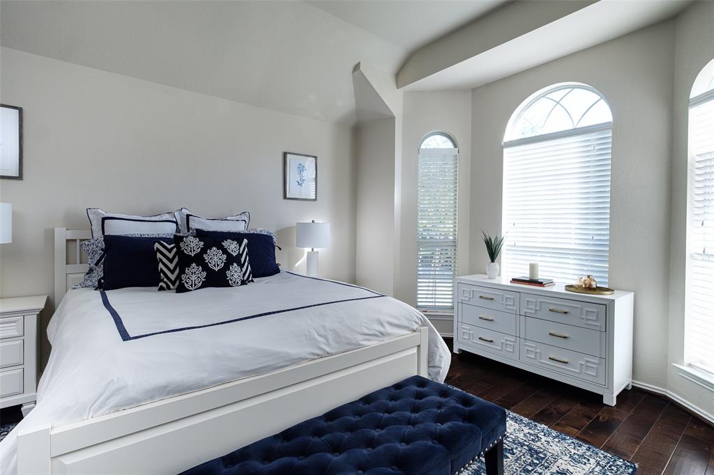 2513 Hunters Run Drive Plano, TX 75025 - Photo 19 of 36 a bedroom with a bed and a window