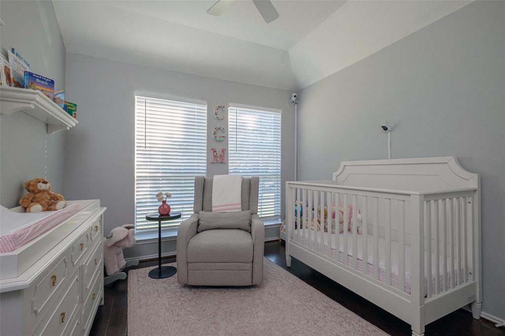 2513 Hunters Run Drive Plano, TX 75025 - Photo 28 of 36 a bedroom with a bed and a window