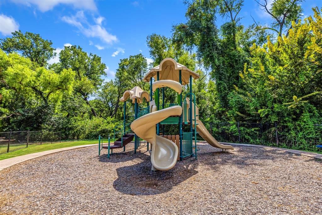 2513 Hunters Run Drive Plano, TX 75025 - Photo 35 of 36 a view of a park with slide