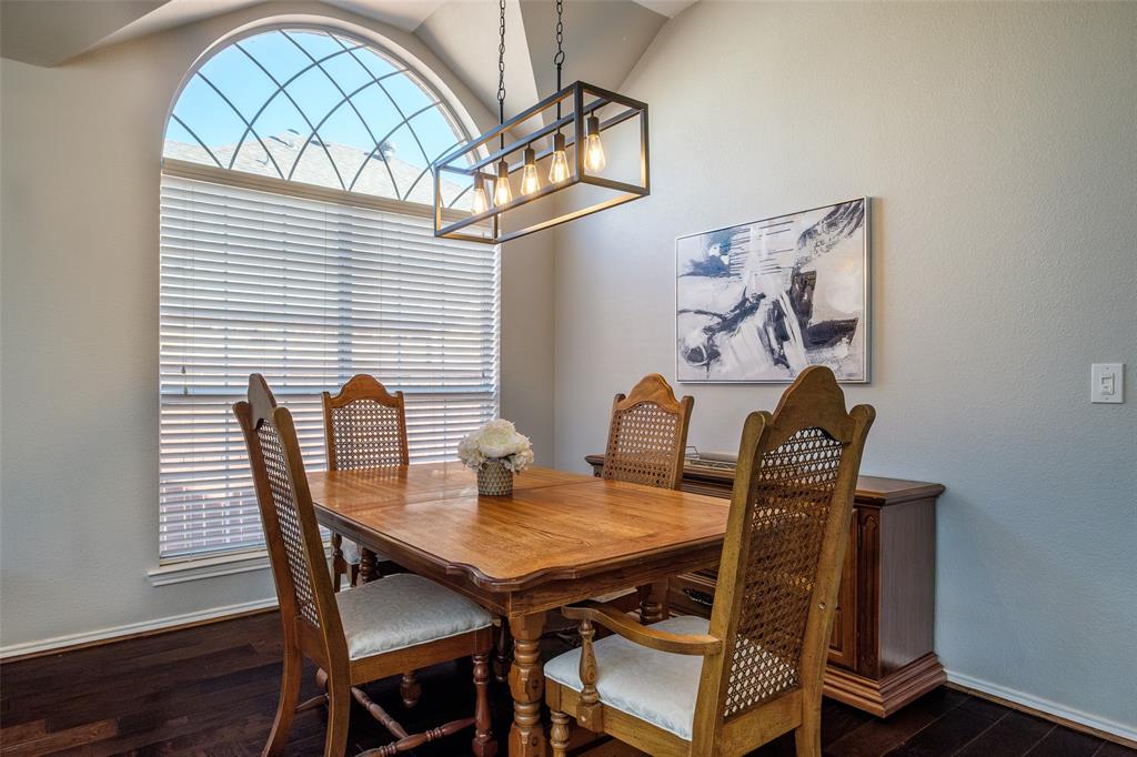 2513 Hunters Run Drive Plano, TX 75025 - Photo 10 of 36 a view of a dining room with furniture and wooden floor